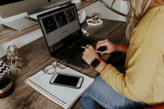 person working on a laptop in remote